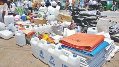 Rohingya people sell relief products in the market