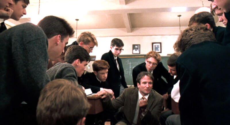 Robin Williams (as John Keating) kept his students bemused with the teaching. 