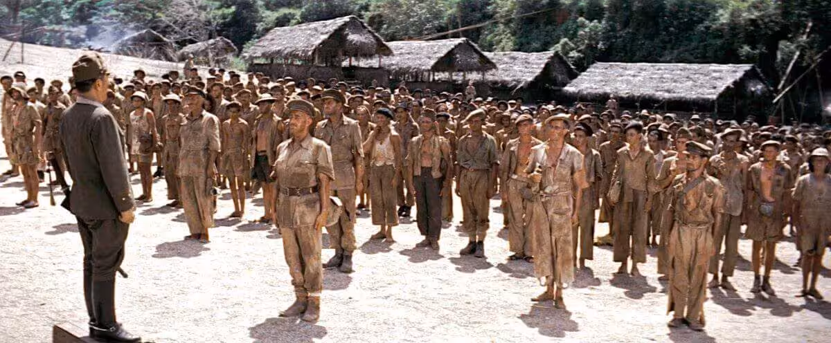 Colonel Nicholson in front of Japanese Colonel Saito with his soldiers in The Bridge of the River Kwai 1957 film.