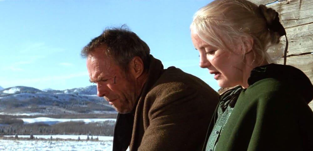 Clint Eastwood and Anna Thompson as William Munny and Dalilah Fitzgerald in Unforgein 1992 film
